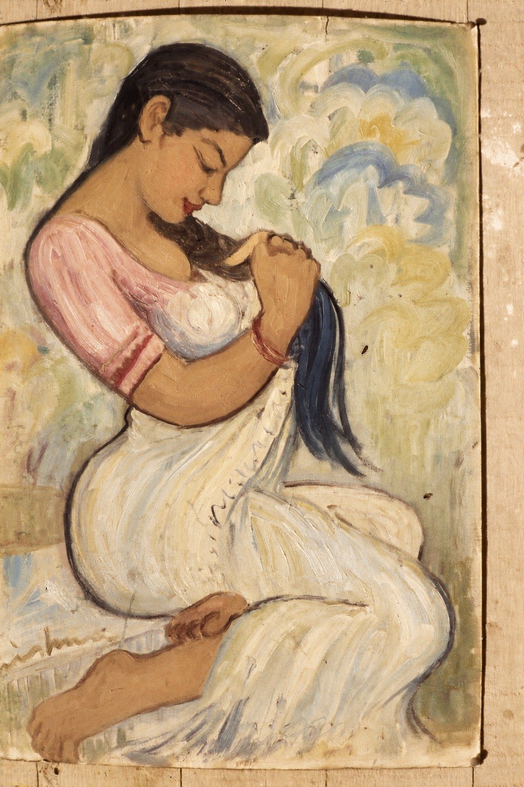 Woman braiding her hair