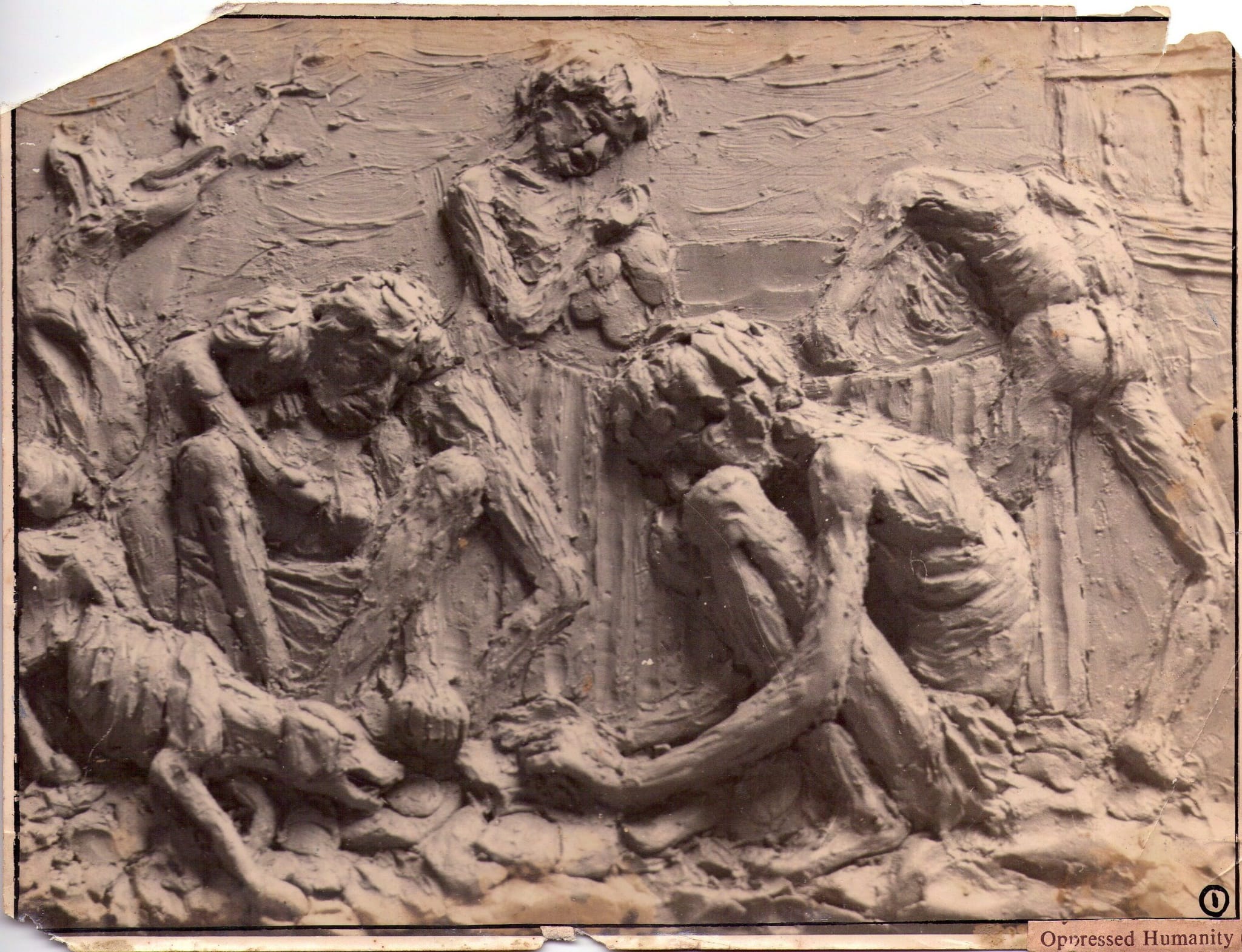 Oppressed Humanity relief sculpture